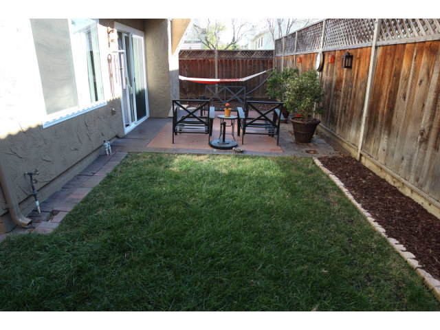 74 Redding Road Campbell, CA 95008 - Photo 19 of 21 a view of backyard with outdoor seating a patio and a garden