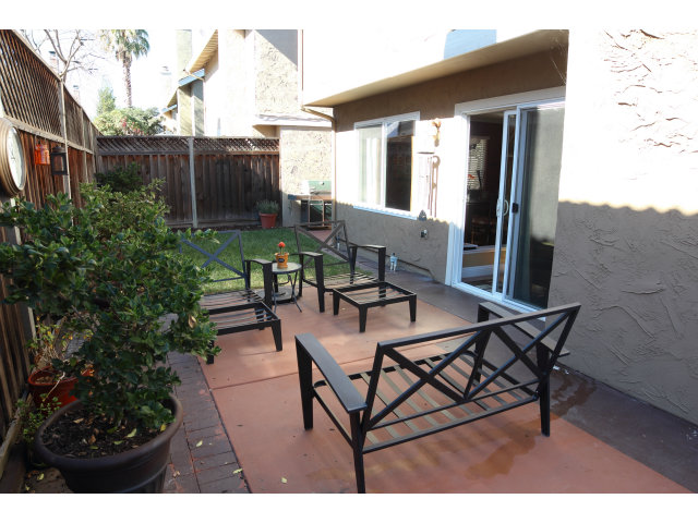 74 Redding Road Campbell, CA 95008 - Photo 20 of 21 a patio with table and chairs