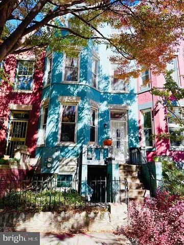 a view of a house with swimming pool