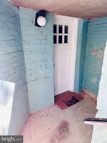 a kitchen with stainless steel appliances granite countertop a refrigerator a stove and a sink