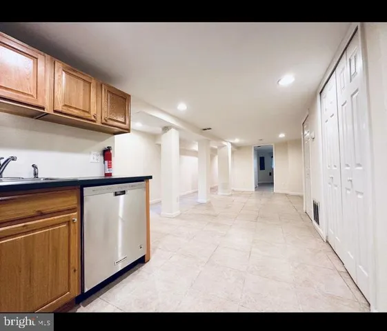 a view of empty room with windows