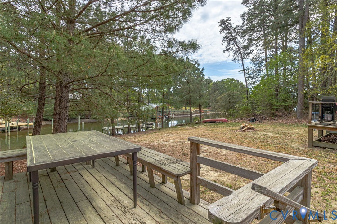 193 Deep Water Lane Reedville, VA 22539 - Photo 70 of 84 a view of a swimming pool with a patio