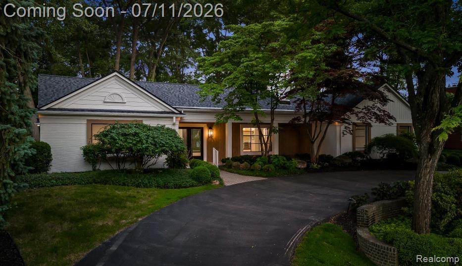 4154 Nearbrook Road Bloomfield Hills, MI 48302 - Photo 1 of 47 Ranch-style exterior with a dark shingled roof and light-colored brick siding