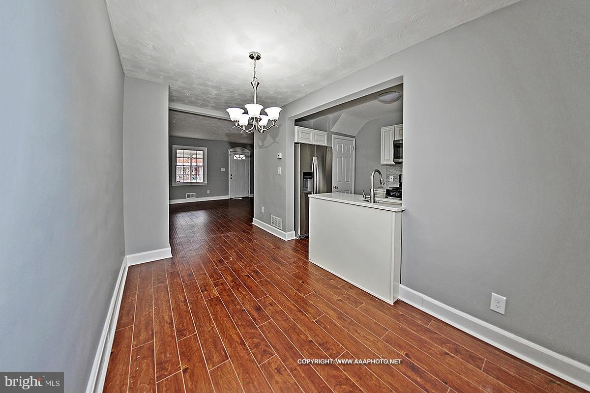 417 Grovethorn Road Middle River, MD 21220 - Photo 3 of 12 a view of a livingroom with wooden floor