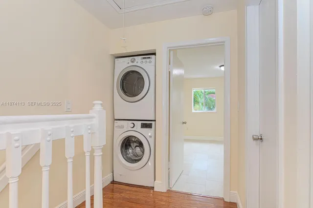 a utility room with dryer and washer