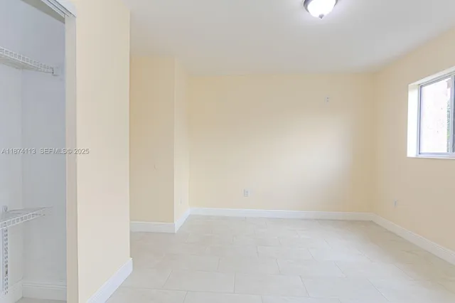 an empty room with a window