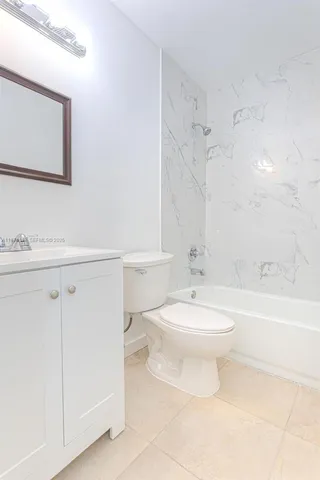 a view of a car park in front of house