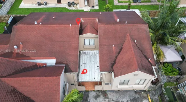 an aerial view of multiple house