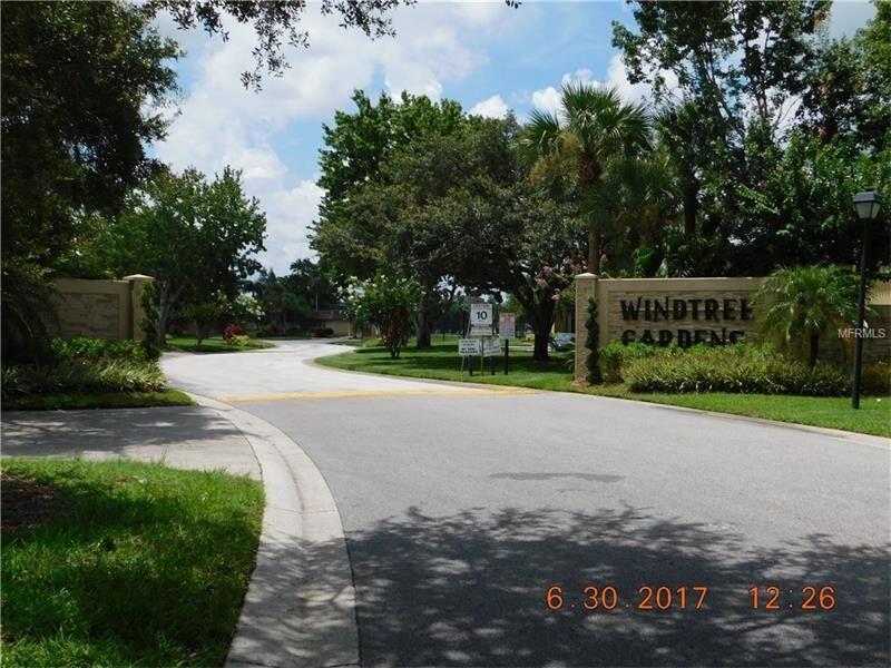 a view of a park with welcome board