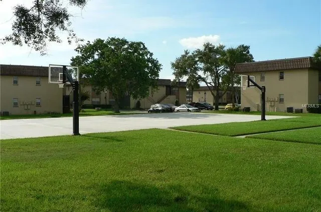 a view of a house with backyard