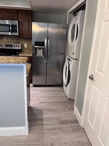 a view of a kitchen with a sink