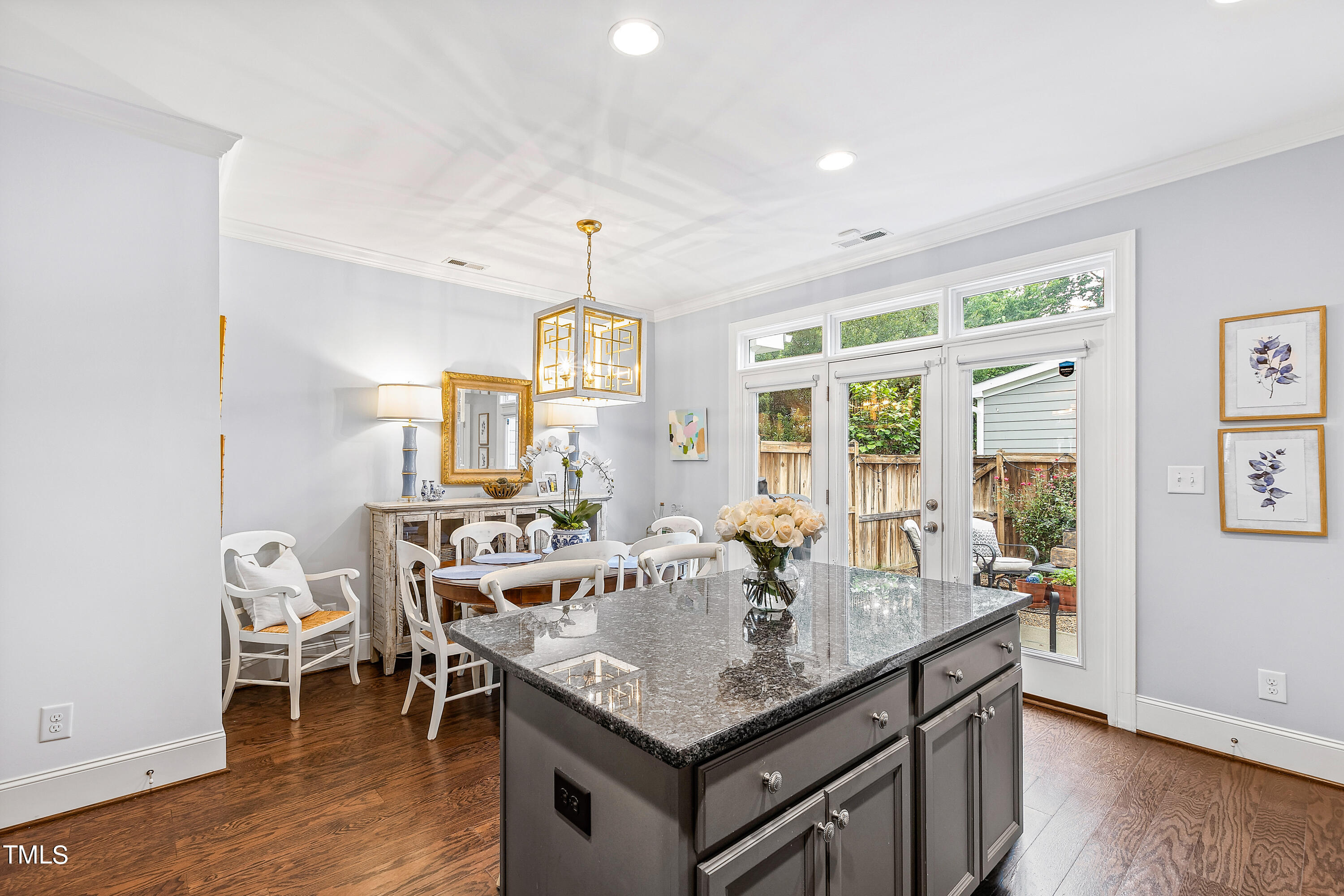 525 Ledbetter Court Raleigh, NC 27608 - Photo 17 of 45 a view of a dining room with furniture window and wooden floor