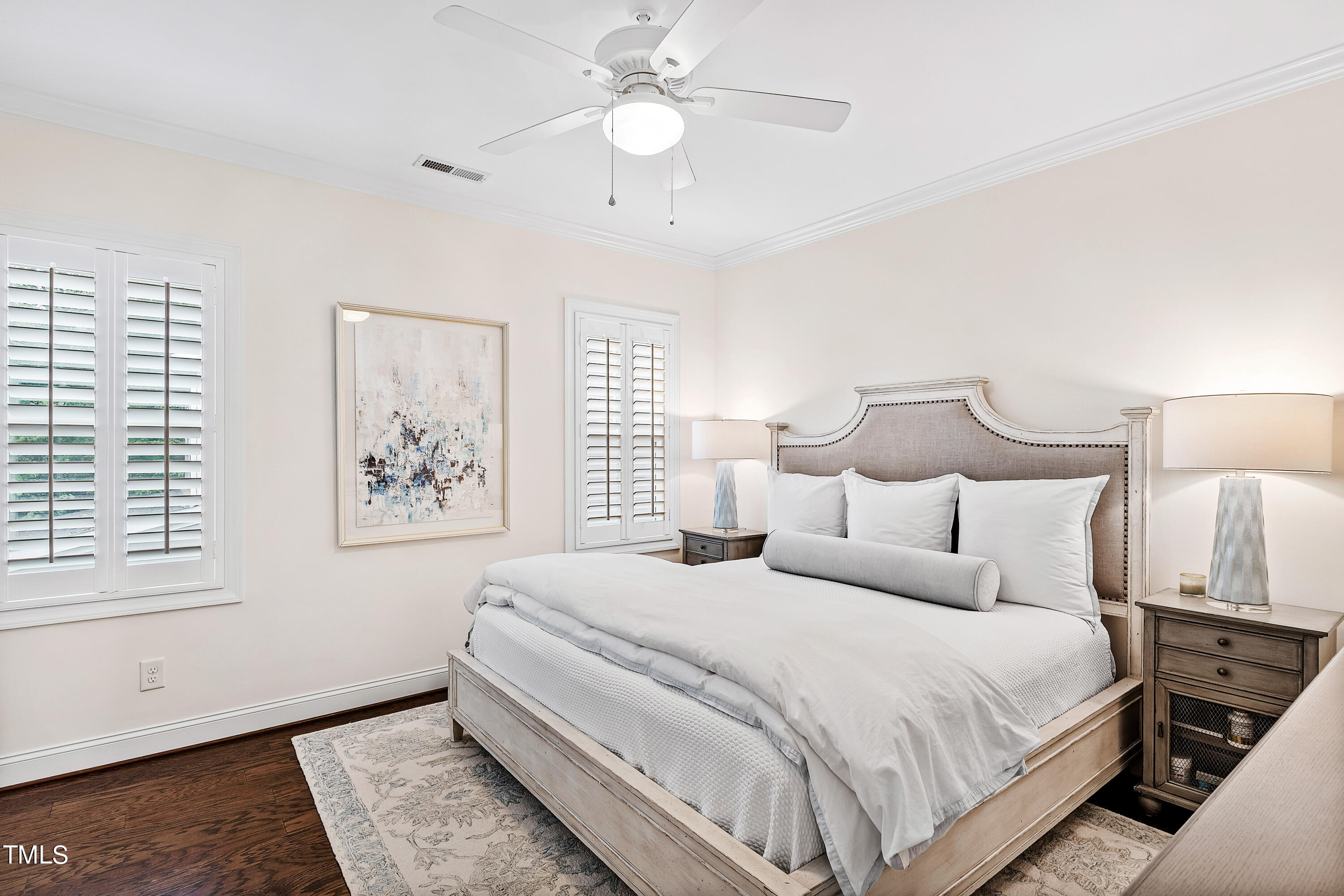 525 Ledbetter Court Raleigh, NC 27608 - Photo 23 of 45 a bedroom with bed and a window