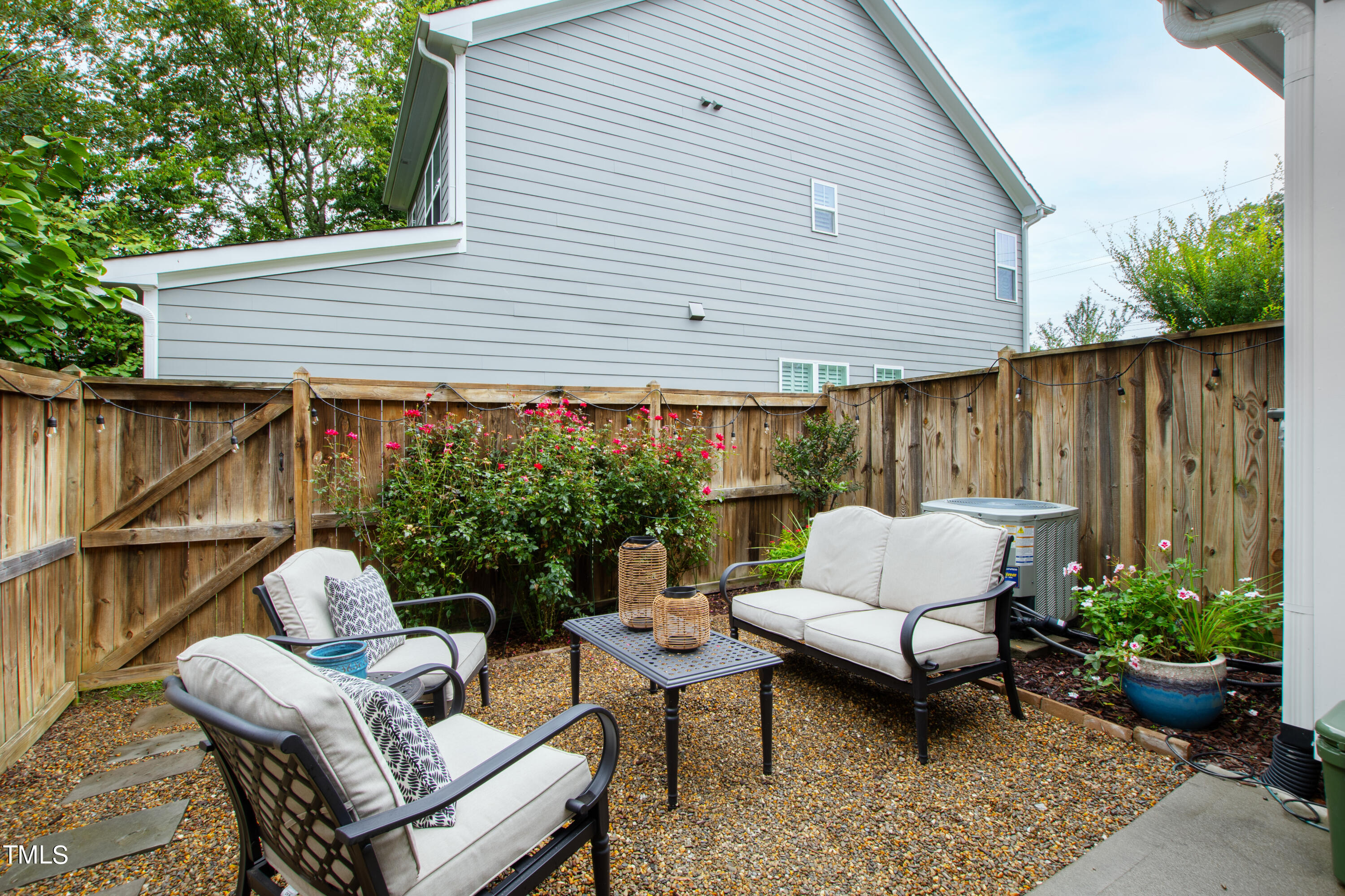 525 Ledbetter Court Raleigh, NC 27608 - Photo 34 of 45 a patio outdoor space with patio couches and a potted plant