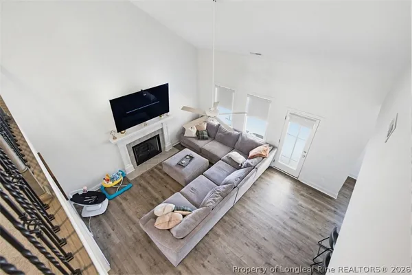 a spacious bedroom with a bed and a desk