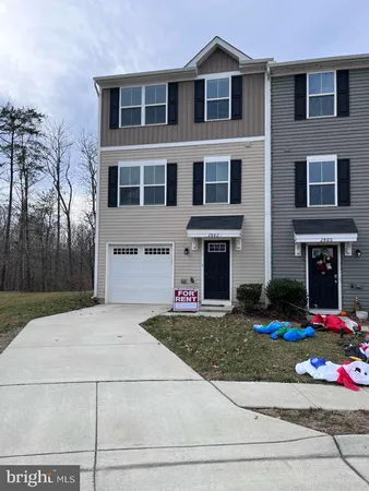 a front view of house with yard