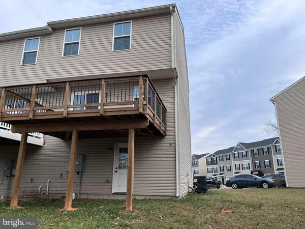 a view of a house with a deck