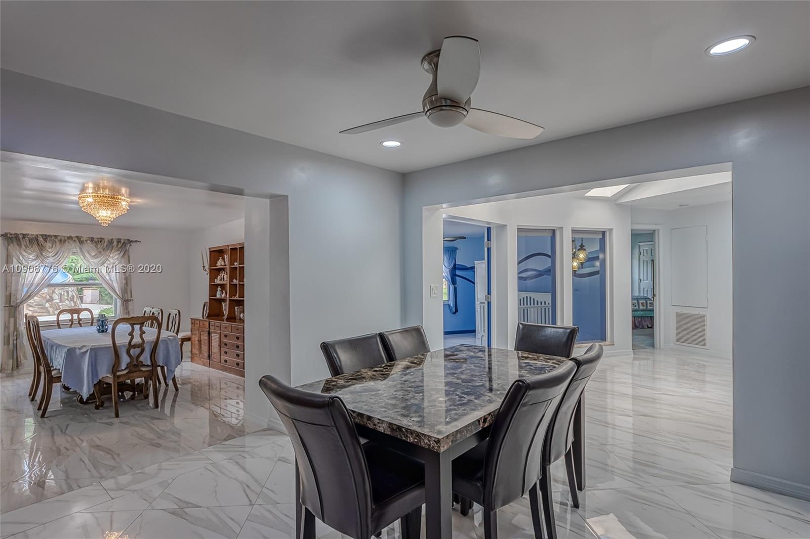 4860 Southwest 193rd Lane Southwest Ranches, FL 33332 - Photo 30 of 80 a view of a dining room with furniture