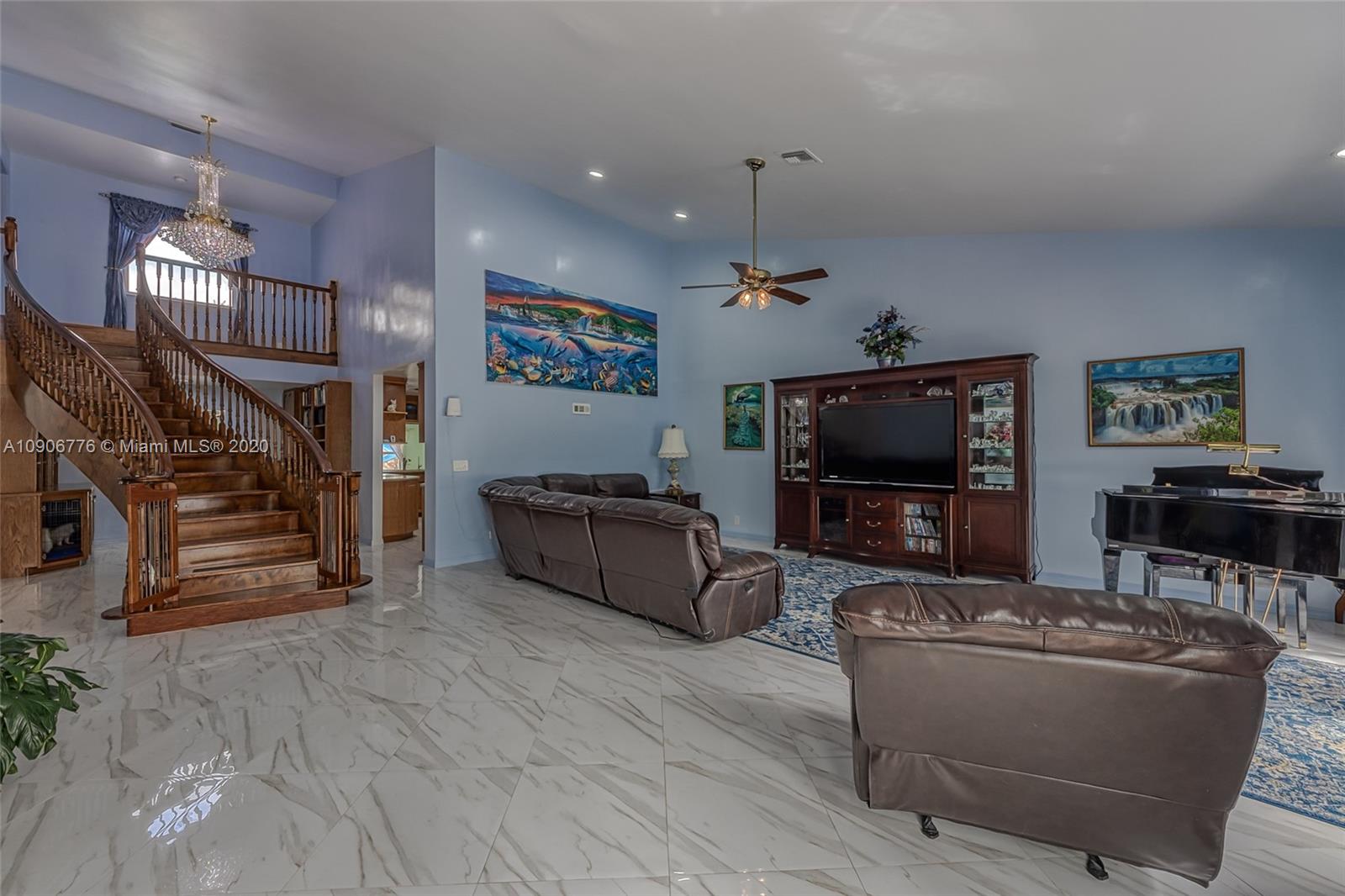 4860 Southwest 193rd Lane Southwest Ranches, FL 33332 - Photo 35 of 80 a living room with furniture and a flat screen tv