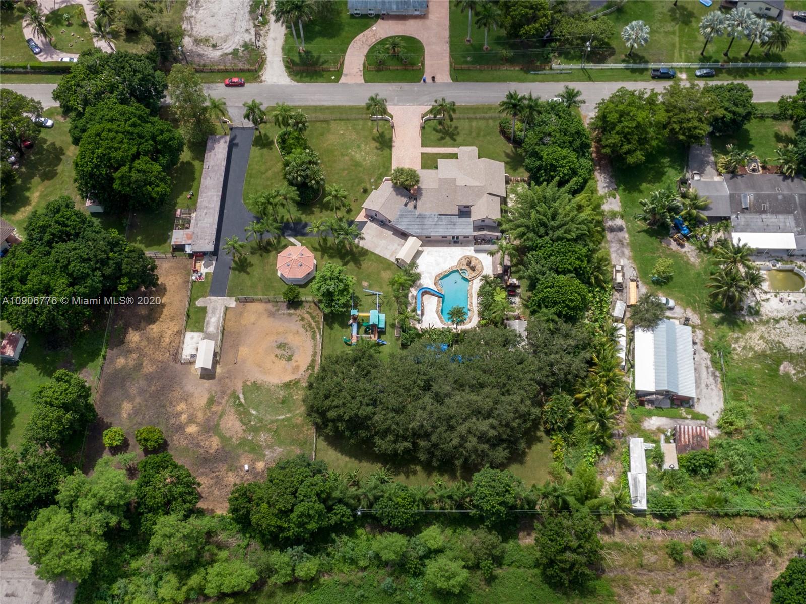 4860 Southwest 193rd Lane Southwest Ranches, FL 33332 - Photo 76 of 80 an aerial view of a house with yard swimming pool and outdoor seating