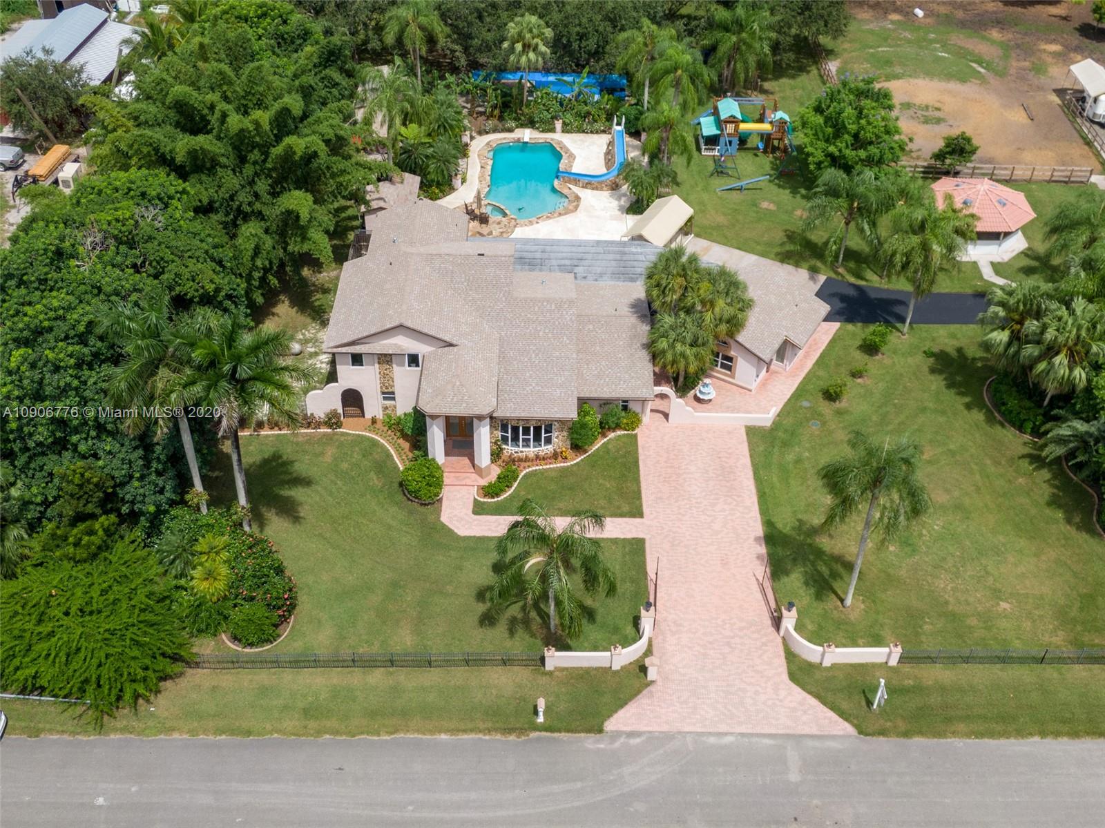 4860 Southwest 193rd Lane Southwest Ranches, FL 33332 - Photo 80 of 80 an aerial view of a house