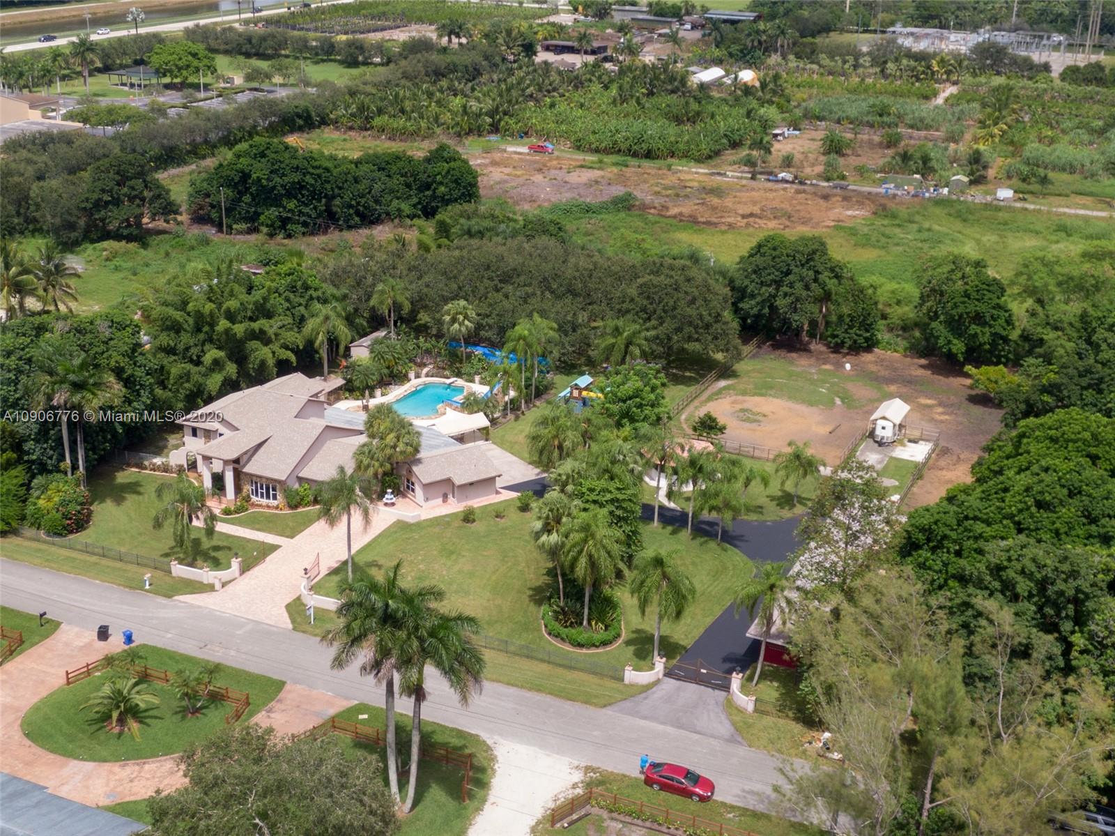 4860 Southwest 193rd Lane Southwest Ranches, FL 33332 - Photo 8 of 80 an aerial view of residential house with outdoor space