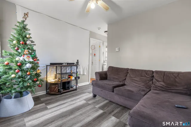 a living room with furniture and a couch