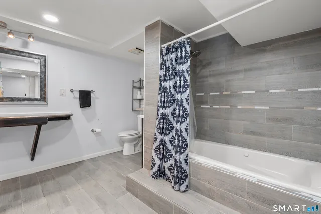 a view of a storage & utility room with washer and dryer