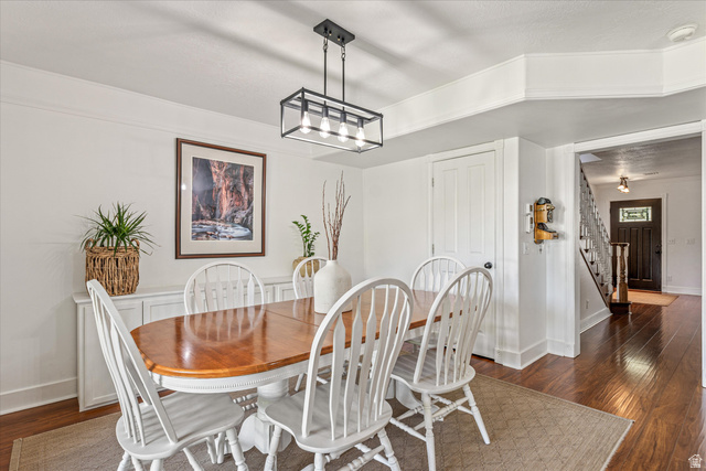 246 West Mount Charm Road Toquerville, UT 84774 - Photo 16 of 70 Dining area featuring dark wood-style floors and suspended lighting