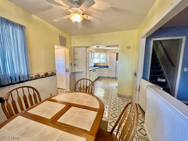 7987 Ridge Road North Royalton, OH 44133 - Photo 12 of 45 Dining area featuring a ceiling fan and light floors