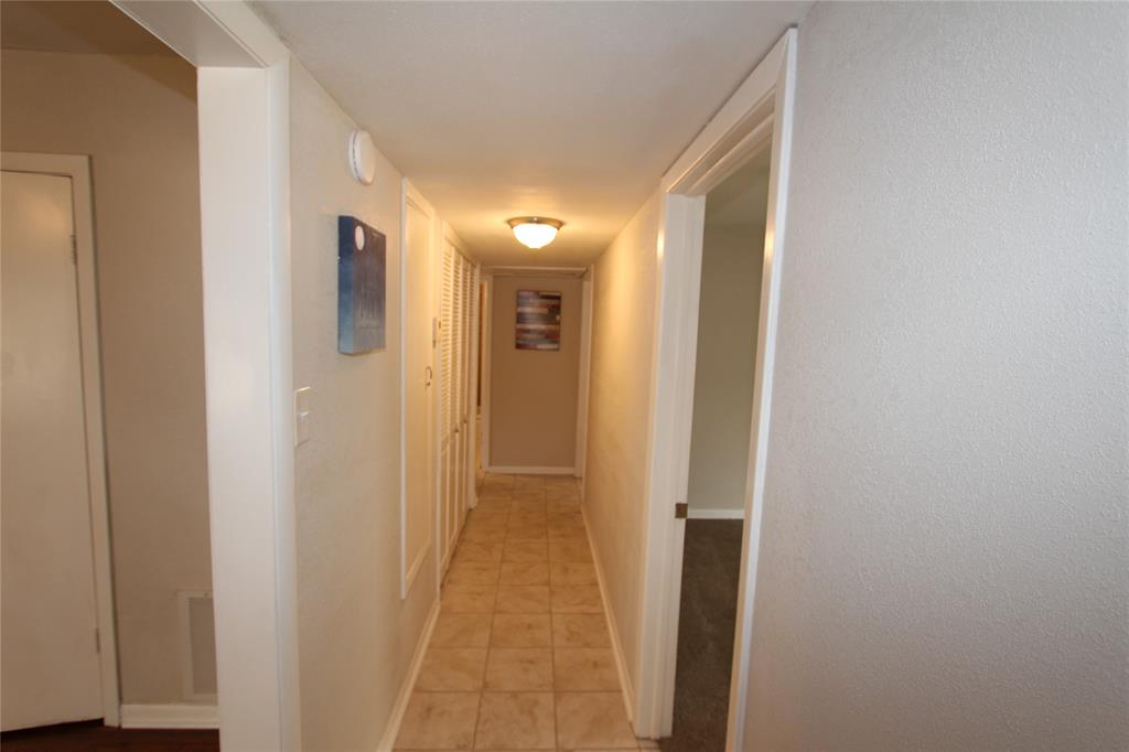 625 South Andrews Avenue Sherman, TX 75090 - Photo 3 of 17 a view of a hallway with wooden floor