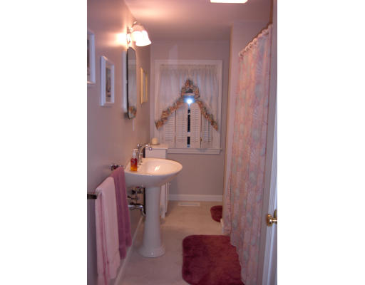 15 Newcomb Road Westminster, MA 01473 - Photo 4 of 6 a bathroom with a sink and a mirror