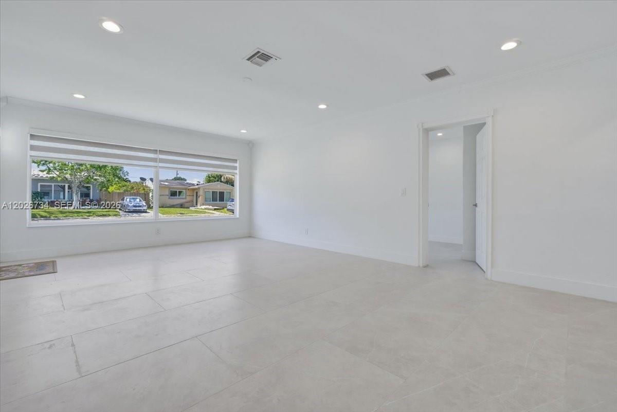 266 Southwest 6th Street Dania Beach, FL 33004 - Photo 6 of 37 an empty room with windows