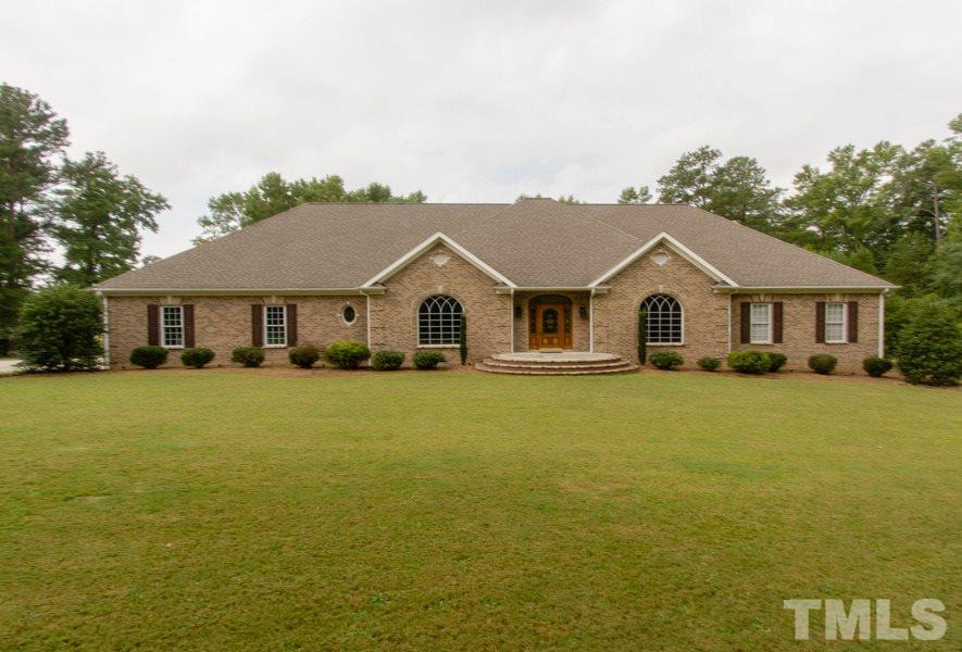 5508 Watkins Road Wendell, NC 27591 - Photo 1 of 25 a view of a white house with a yard