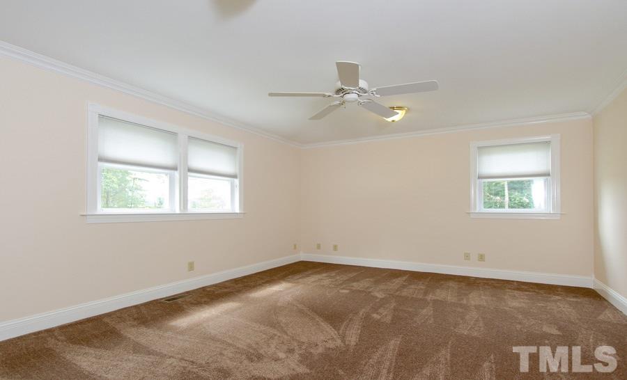 5508 Watkins Road Wendell, NC 27591 - Photo 14 of 25 an empty room with a window