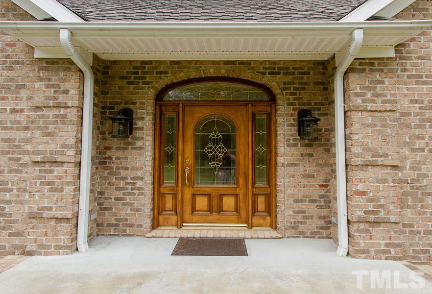 5508 Watkins Road Wendell, NC 27591 - Photo 3 of 25 a front view of a house with glass door and door