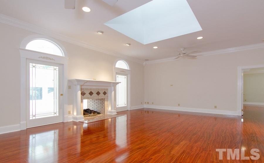 5508 Watkins Road Wendell, NC 27591 - Photo 6 of 25 a view of empty room with wooden floor