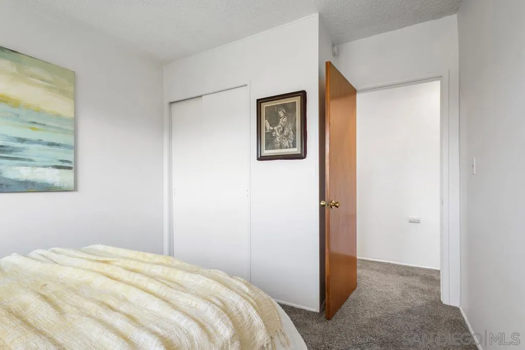 856 Oneonta Avenue Imperial Beach, CA 91932 - Photo 18 of 34 a bedroom with a bed and a window