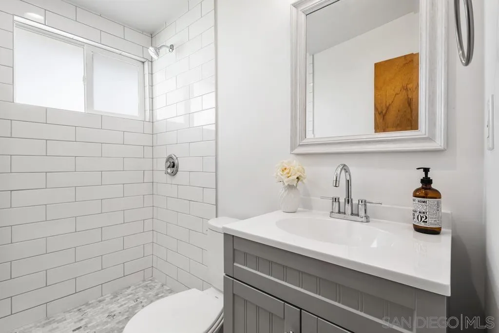 856 Oneonta Avenue Imperial Beach, CA 91932 - Photo 21 of 34 a bathroom with a sink a toilet and shower