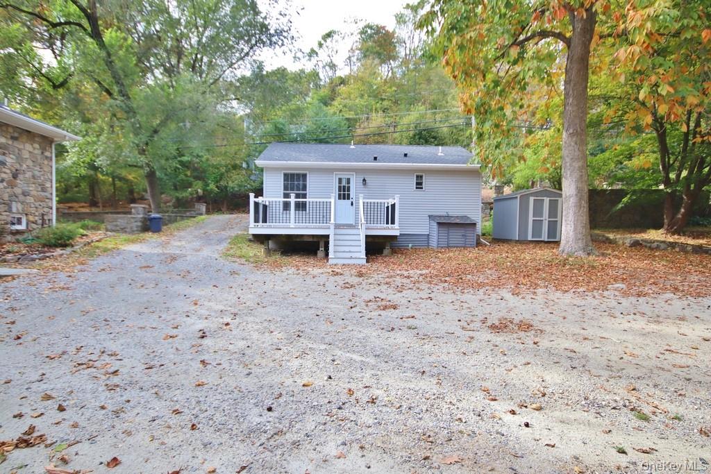 235 Haviland Drive Patterson, NY 12563 - Photo 15 of 18 front view of a house with a yard