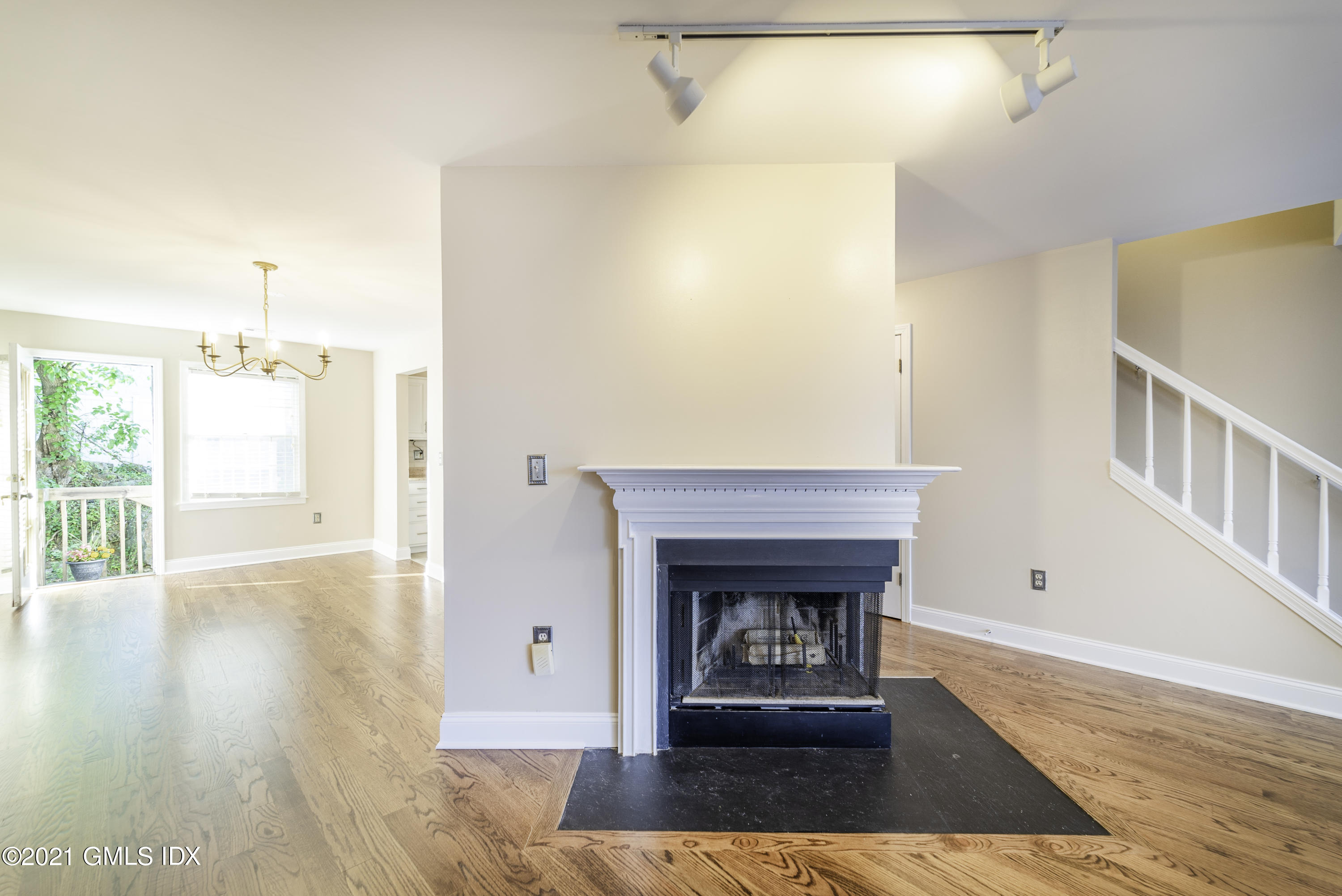 150 Prospect Street, Unit 23 Greenwich, CT 06830 - Photo 5 of 20 a floor with fireplace and a wooden floor