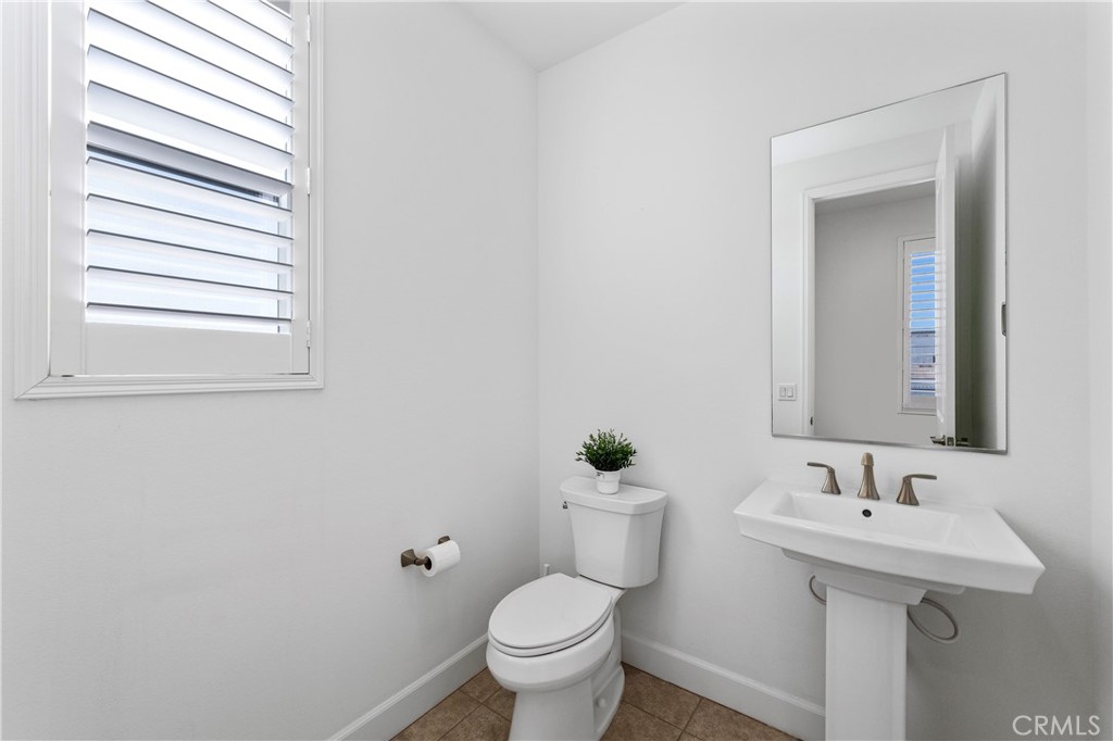 105 Shear Irvine, CA 92618 - Photo 13 of 35 a bathroom with a sink and a toilet