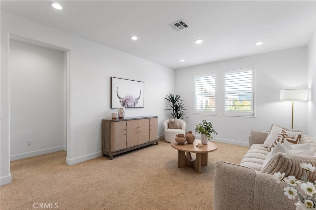 105 Shear Irvine, CA 92618 - Photo 14 of 35 a living room with furniture and window