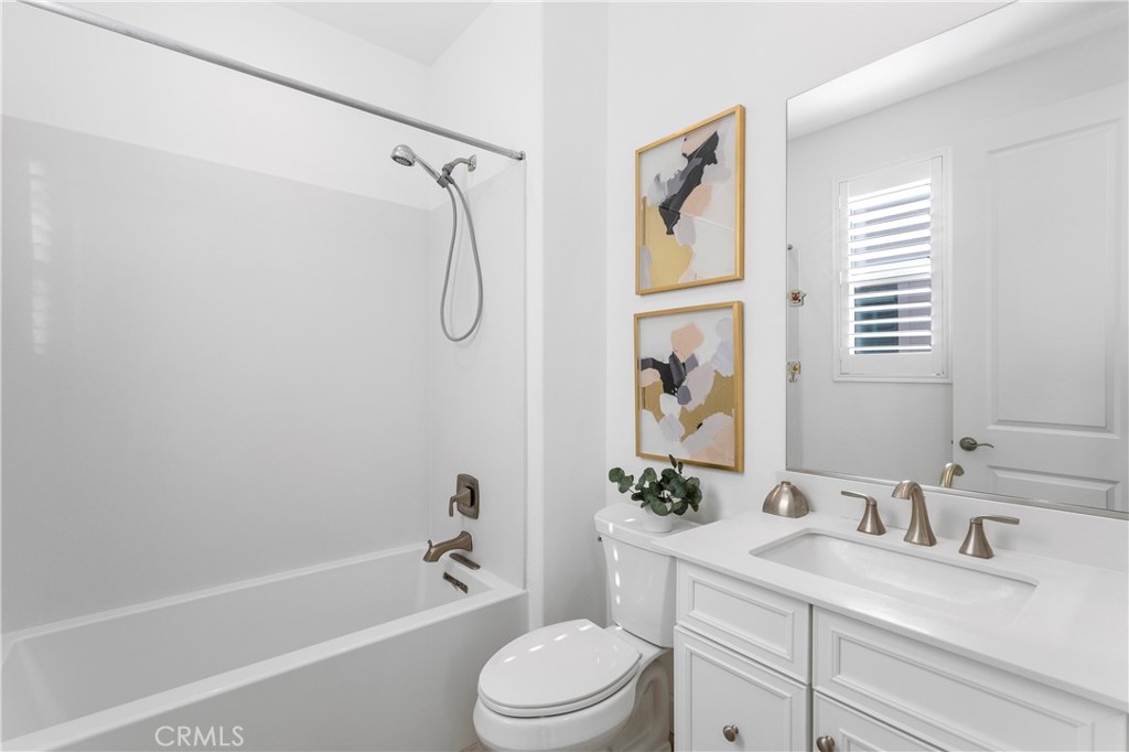105 Shear Irvine, CA 92618 - Photo 18 of 35 a bathroom with a granite countertop sink toilet tub and shower