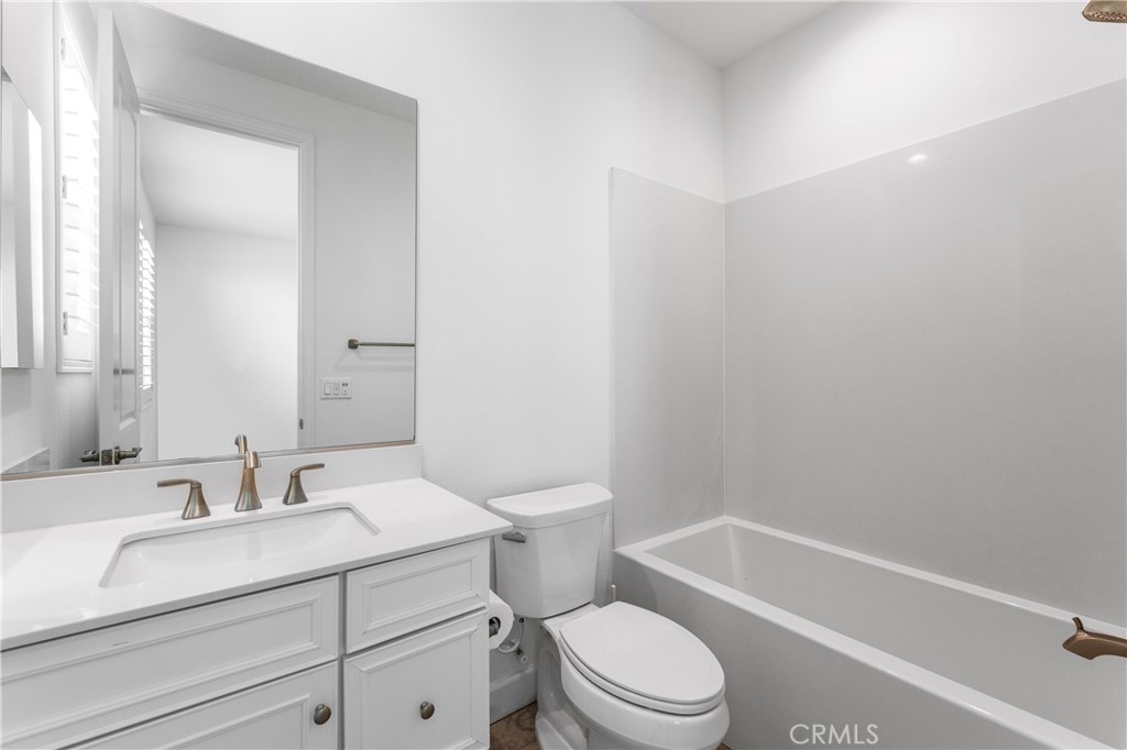 105 Shear Irvine, CA 92618 - Photo 21 of 35 a bathroom with a sink a toilet and shower