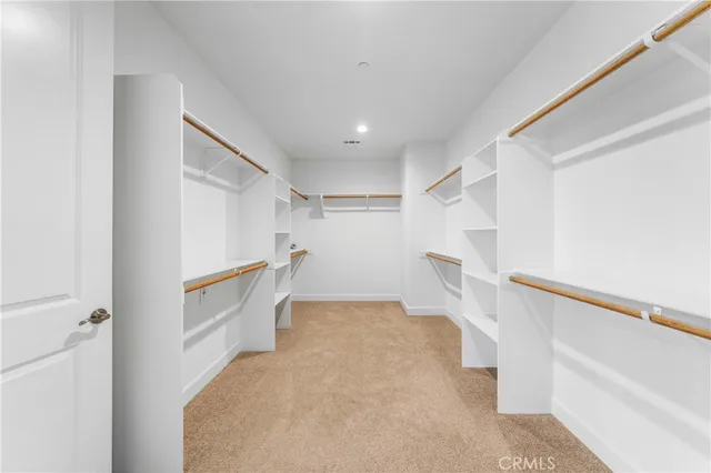 a view of entryway with white walls and stairs