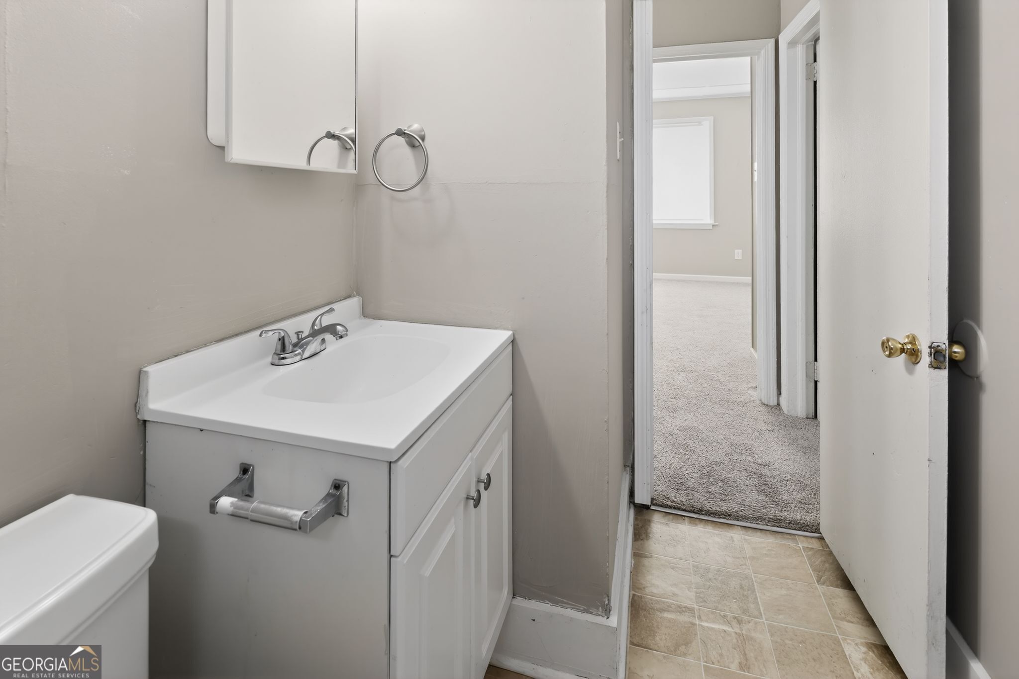 2835 Fairmount Street Augusta, GA 30906 - Photo 21 of 30 a bathroom with a sink a toilet and shower