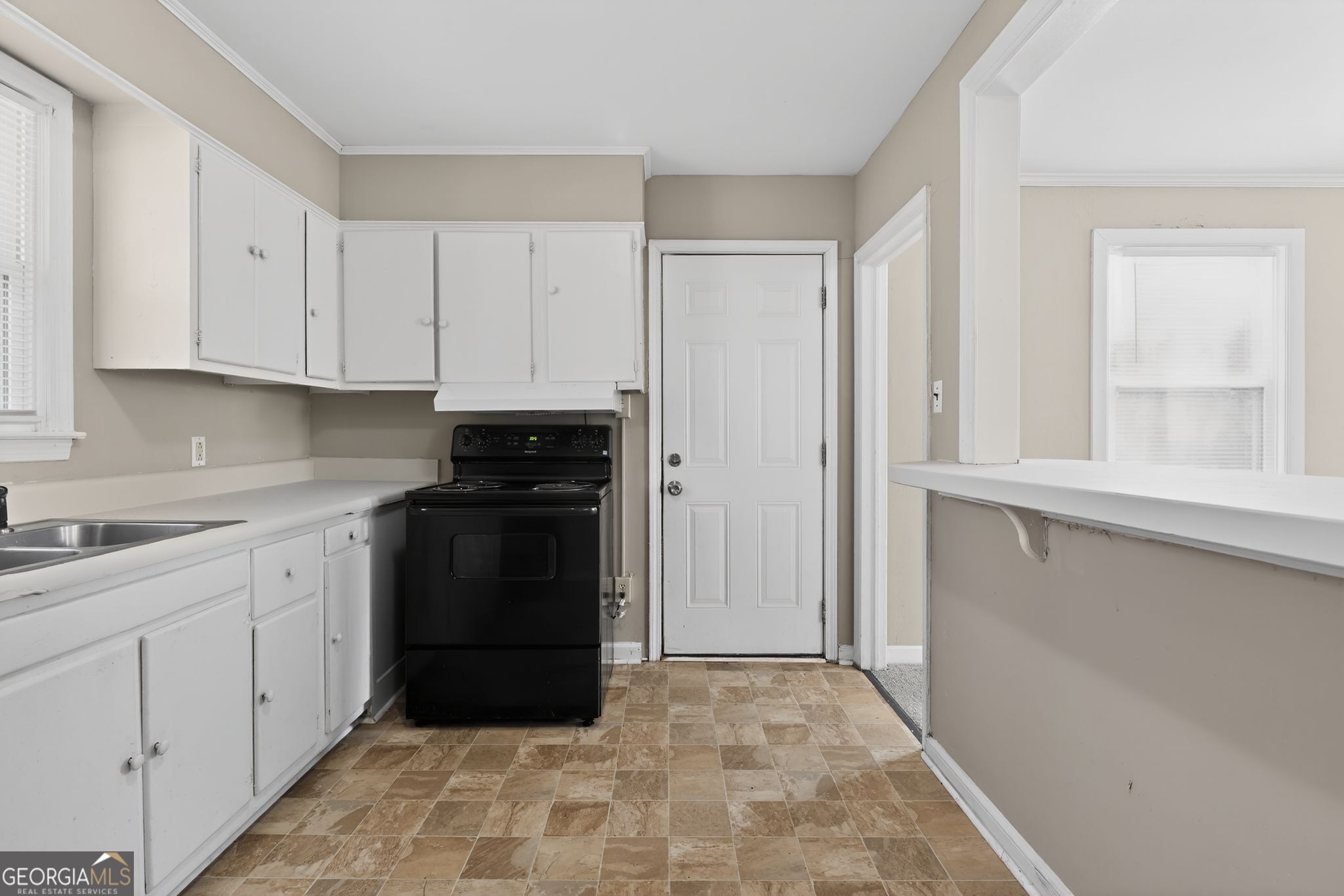 2835 Fairmount Street Augusta, GA 30906 - Photo 8 of 30 a kitchen with a stove top oven and cabinets
