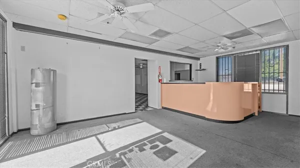 a very nice looking room with a black white checkered floor