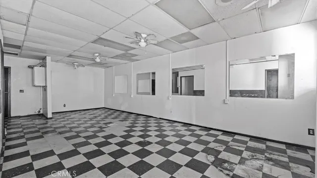 a view of a storage & utility room with a washer dryer